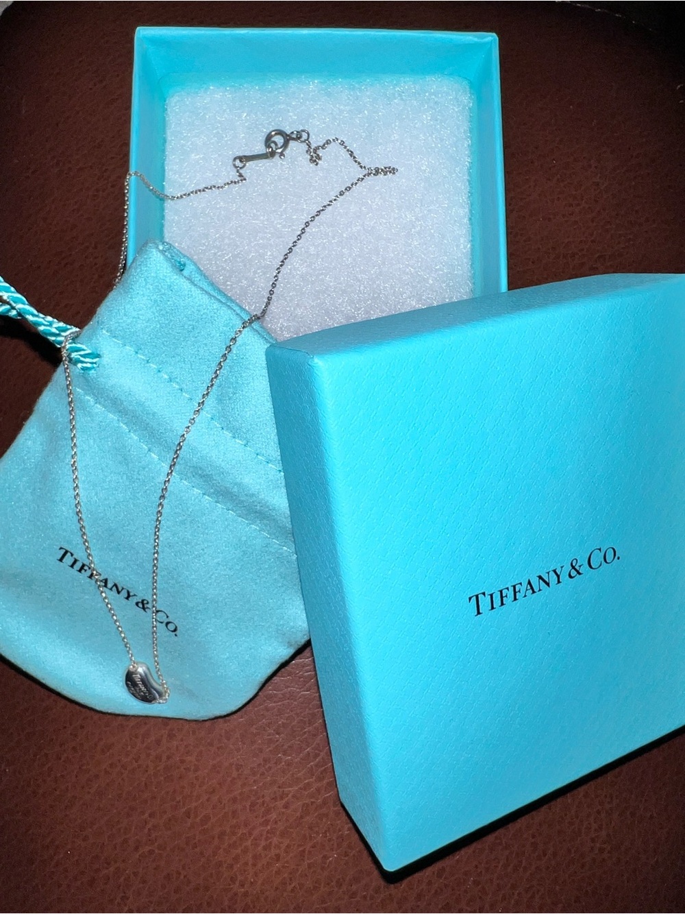 Tiffany & Co. Silver small bean pendant with pouch and box